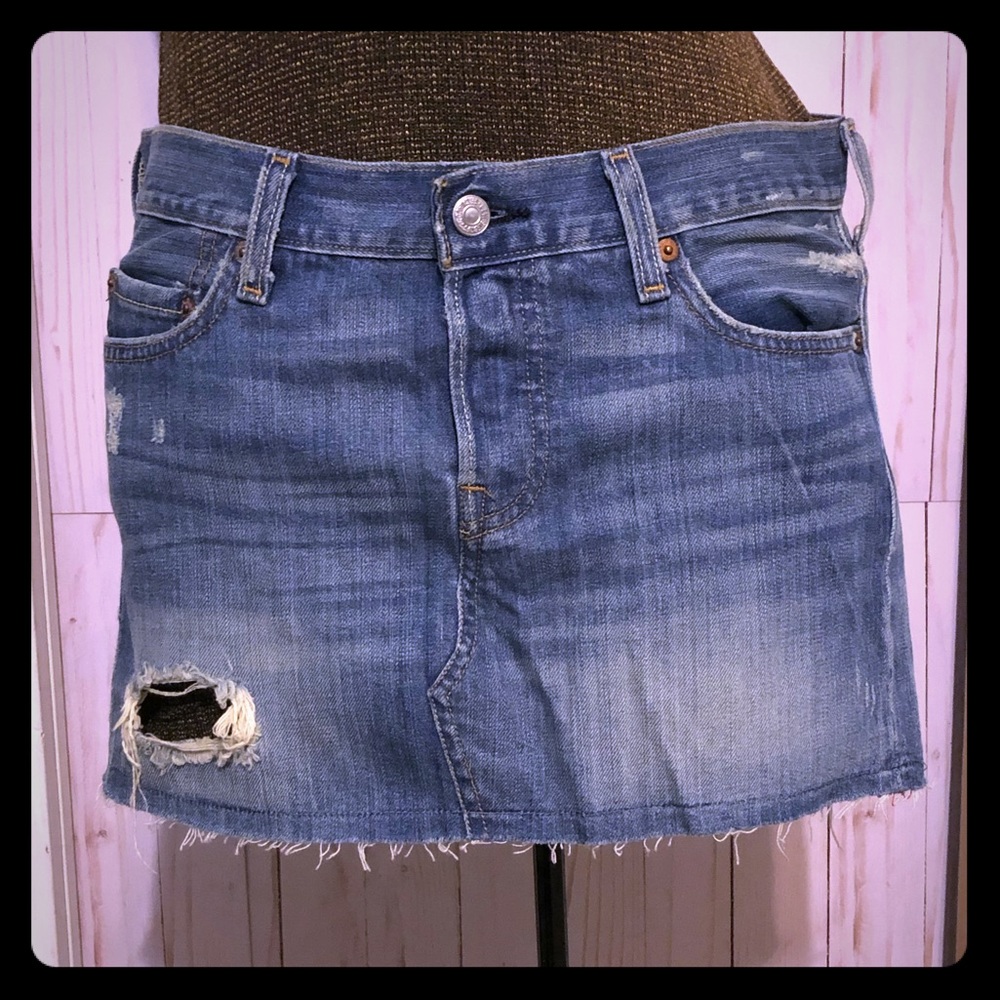 Levi’s 501 button fly distressed jean mini skirt
